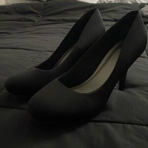 Black 4/5 inch heels. never warn